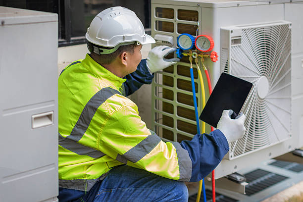 Professional Hvac technician working in Attleboro Falls, MA